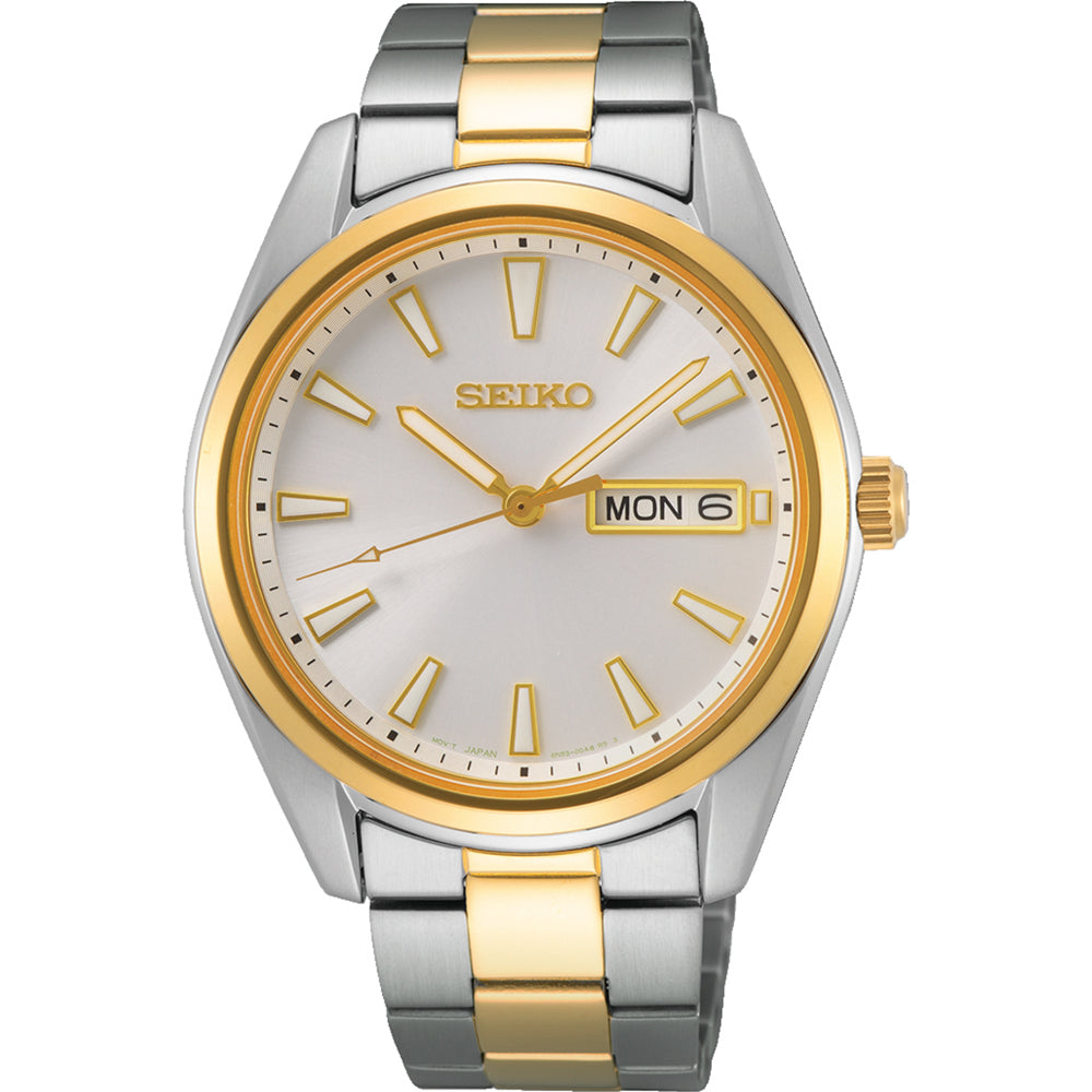 Zegarek męski Seiko z srebrną i złotą kopertą, białą tarczą oraz metalową bransoletą.