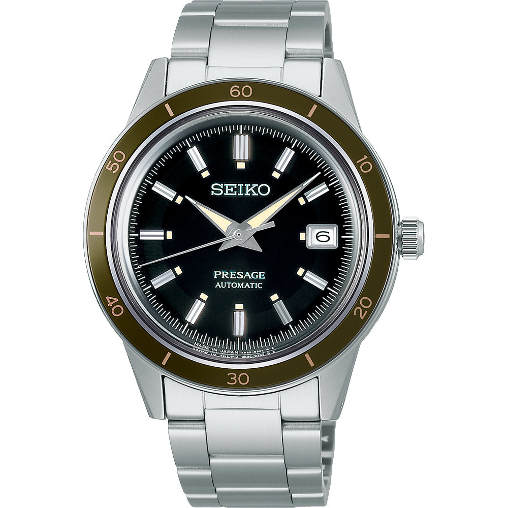 Het Seiko Presage heren horloge SRPG07J1 heeft een automatisch uurwerk, een zwarte wijzerplaat met zilveren uurmarkeringen, een datumvenster op 3 uur en een bruine lunette met minutenmarkeringen. Het wordt geleverd met een strakke zilveren metalen band.