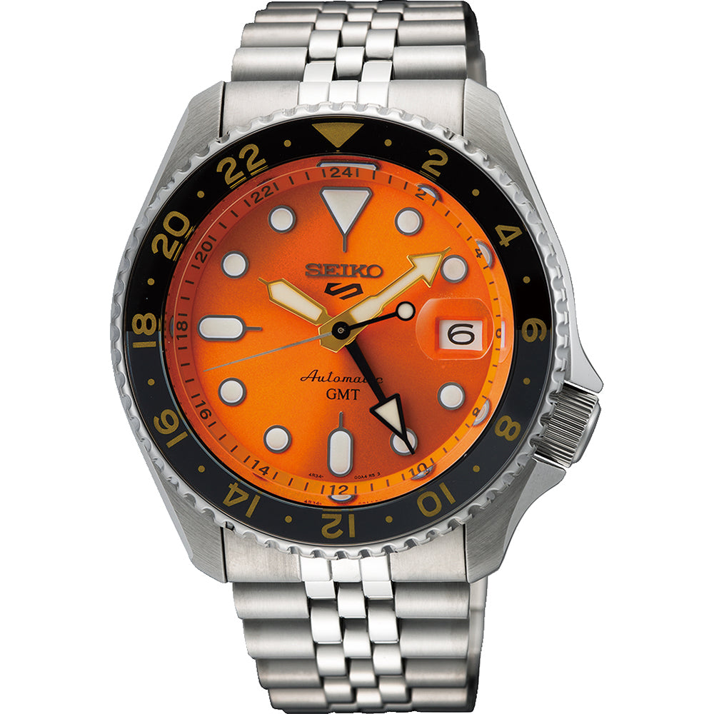 Zegarek męski Seiko 5 Sports z pomarańczową tarczą, stalowa koperta i bransoleta, czarny bezel.