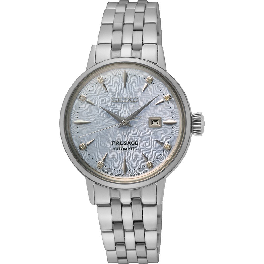 Srebrny zegarek damski Seiko z automatycznym mechanizmem, jasnoniebieska tarcza i metalowa bransoleta.