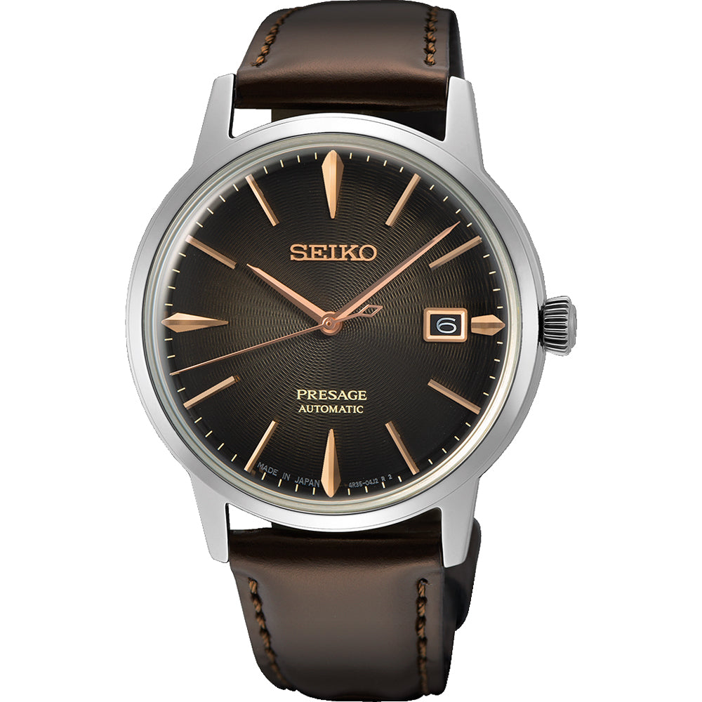 Zegarek męski Seiko Presage z brązowym paskiem, srebrną kopertą i ciemną tarczą.
