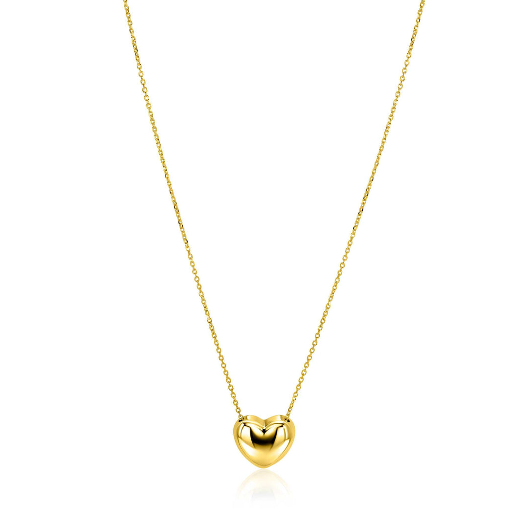 De Zinzi ketting ZIC2672G is een delicate gouden ketting van Zinzi, met een gepolijste, glanzende hartvormige hanger in het midden. Afgebeeld op een effen witte achtergrond.