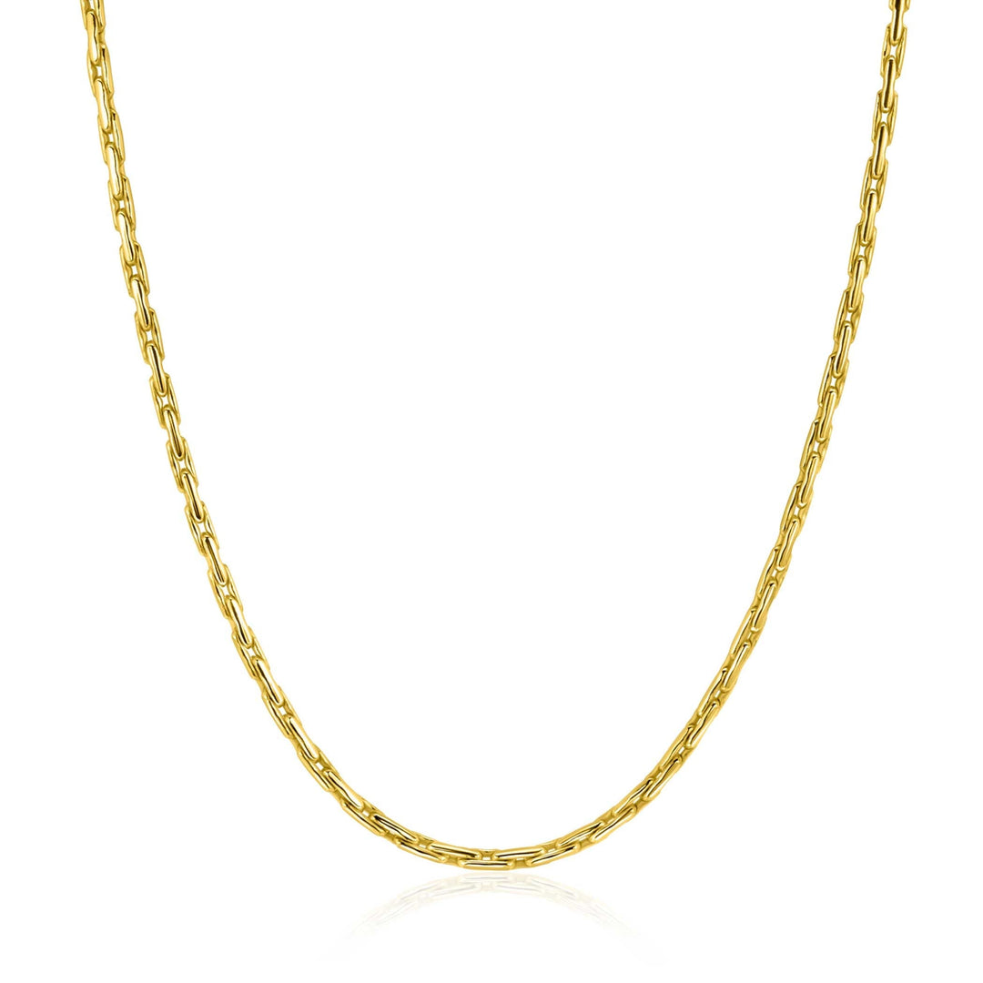 De Zinzi ketting ZIC2648G 43-45cm is een eenvoudige goudkleurige ketting met langwerpige, ovaalvormige schakels - een elegant Zinzi ontwerp tegen een witte achtergrond, perfect voor elke gelegenheid.