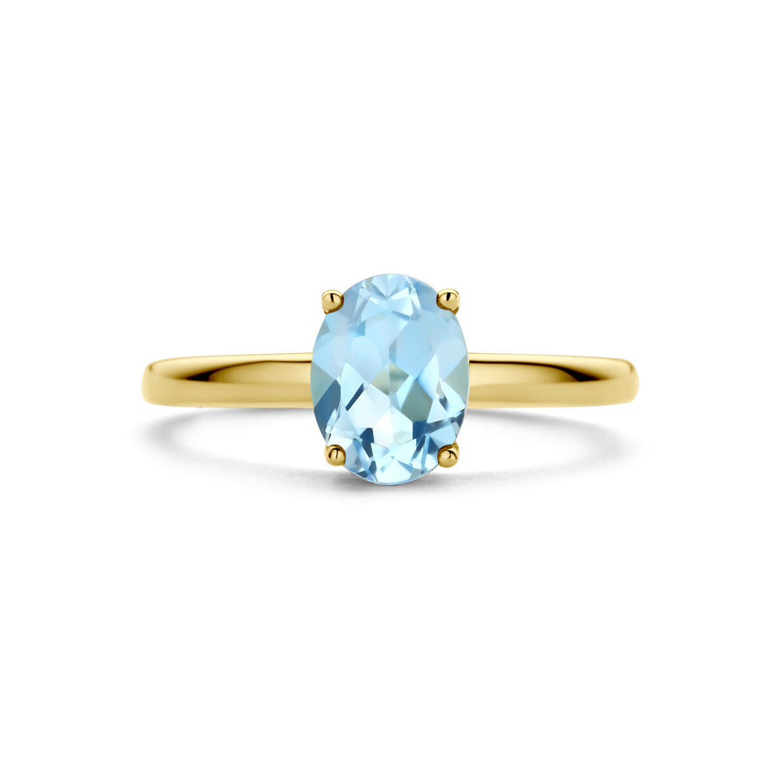geelgouden ring blauwe topaas 14K