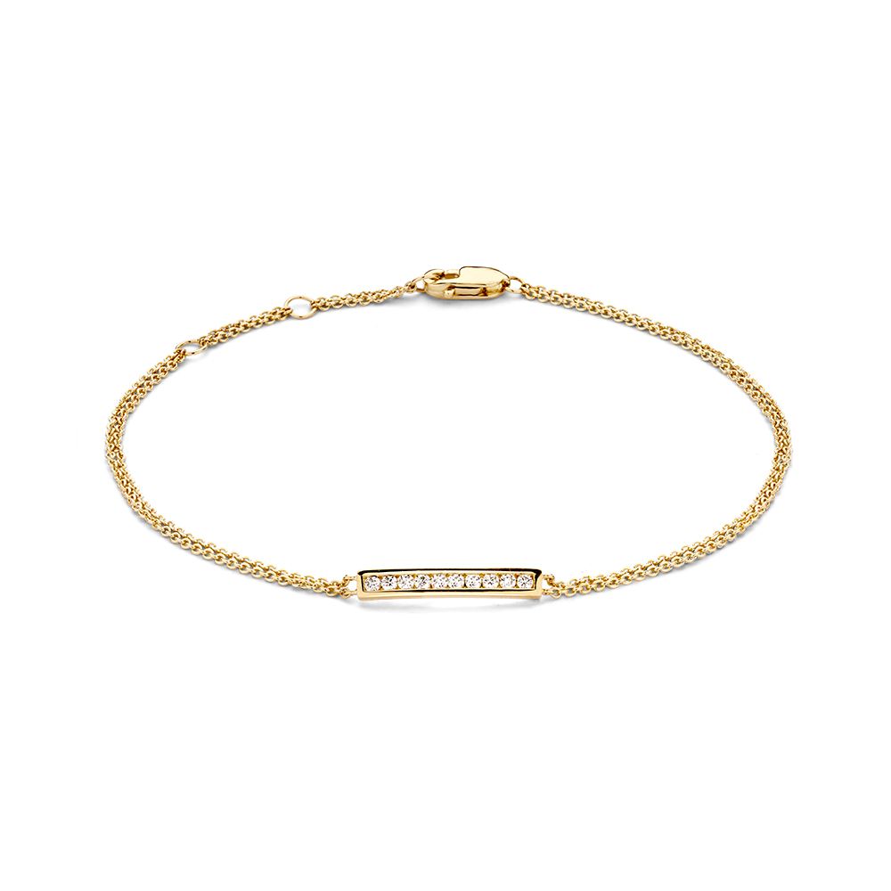 Złota bransoletka z diamentami 14 karatów, 0,12 crt, o długości 18 cm, z eleganckim, prostym wzorem.