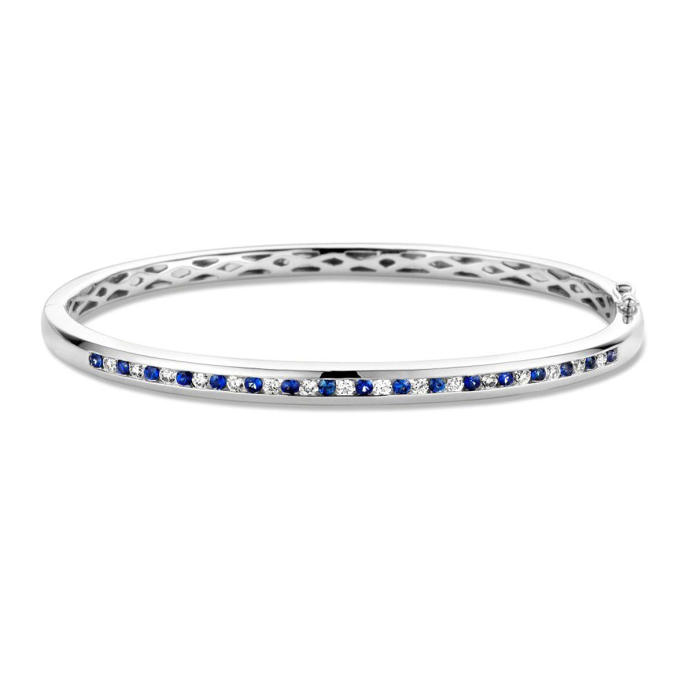 Biała złota bransoleta z diamentem i szafirem – 14 karatów, 0,47 crt diamentu, 60x51 mm.