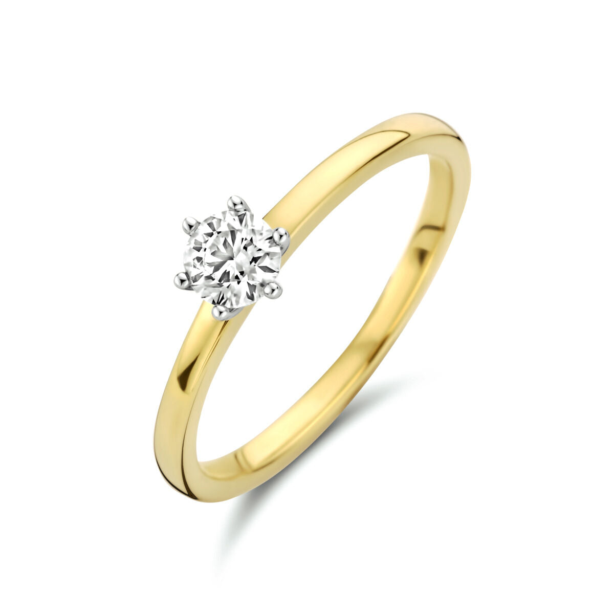pierścionek z diamentem 0,25 ct, złoty z białym złotem, o prostym, eleganckim designie.