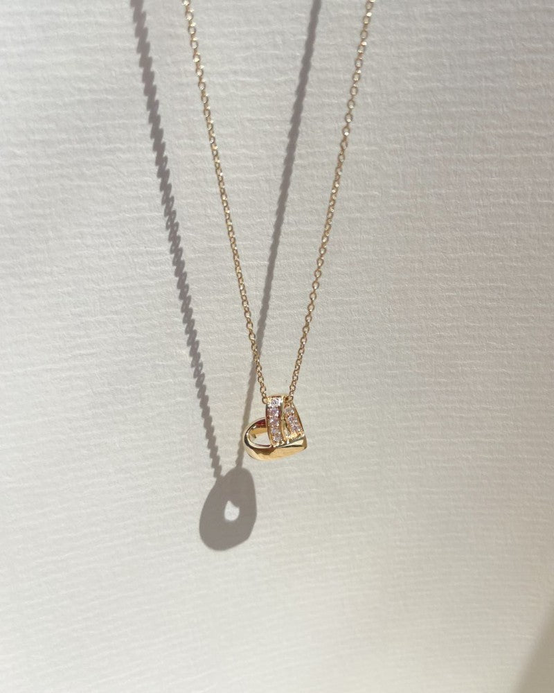 Naszyjnik z wisiorkiem w kształcie serca z żółtego złota z diamentami, 0.06ct