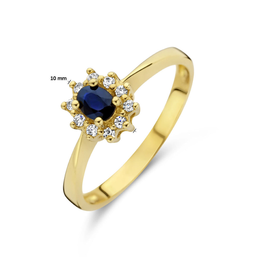 De Van der Kooij Collectie ring saffier en diamant 0.08ct h p1 halo in 14K geelgoud heeft een bloemvormig ontwerp met een ronde saffier, omringd door diamanten. De doorsnede van het cluster is 10 mm.