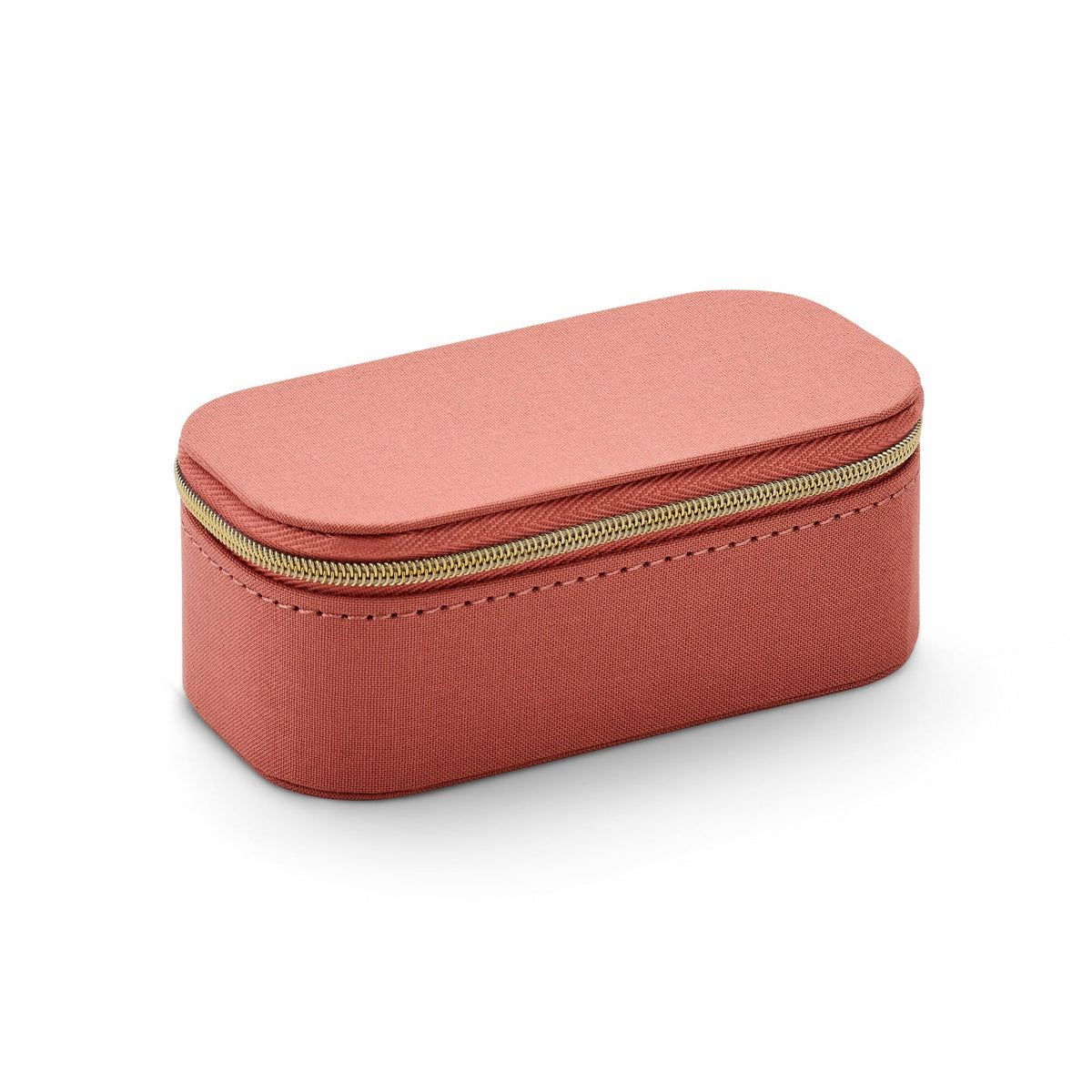 Luksusowe pudełko na biżuterię w miękkim brzoskwiniowym welurze z złotym zamkiem.