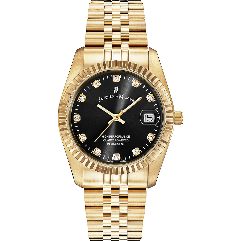 Złoty zegarek z czarną tarczą, diamentowymi indeksami i bransoletą z metalowych ogniw.