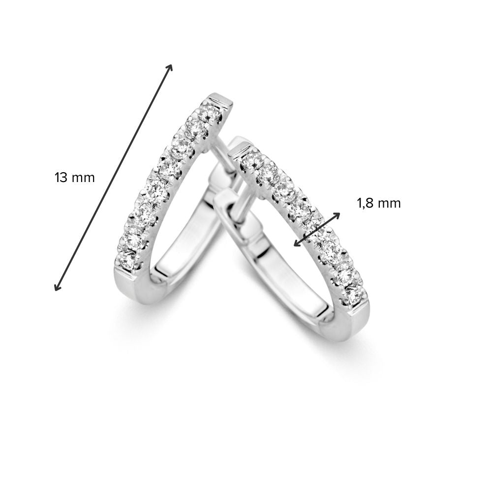 Kolczyki z białego złota z diamentami w ścisłym osadzeniu – elegancja w perfekcji 0,21 crt.