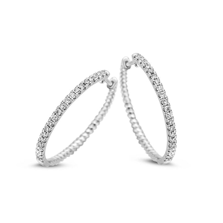 Witgouden oorringen met 0.48 crt diamant – 14 karaat 0,48 crt.