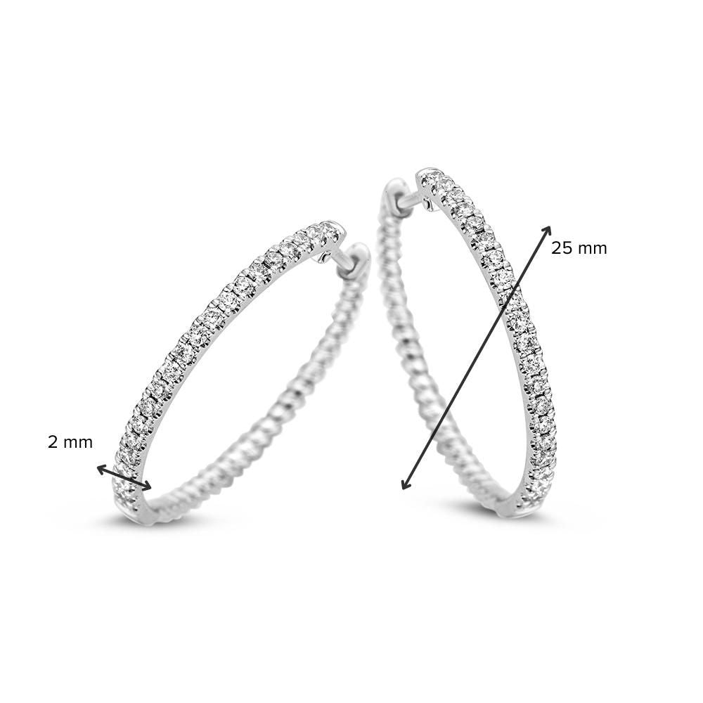 Kolczyki w białym złocie z diamentem 0,48 crt – 14 karat 0,48 crt.
