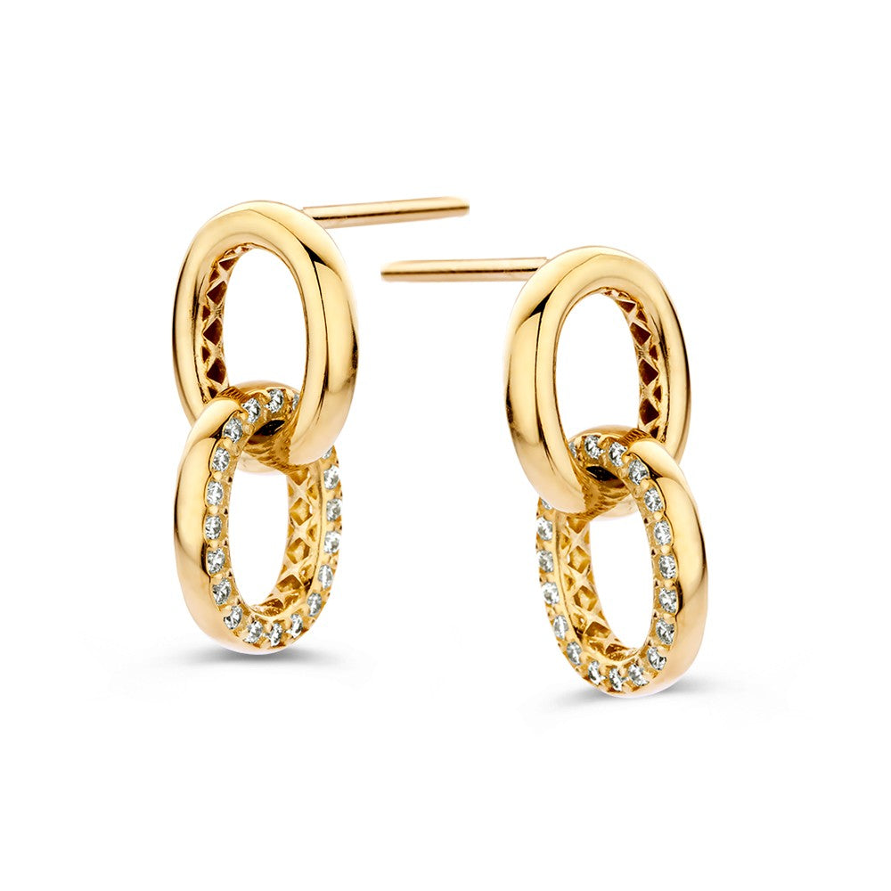 Złote kolczyki z okrągłymi zawieszkami i cyrkoniami, o nowoczesnym designie.