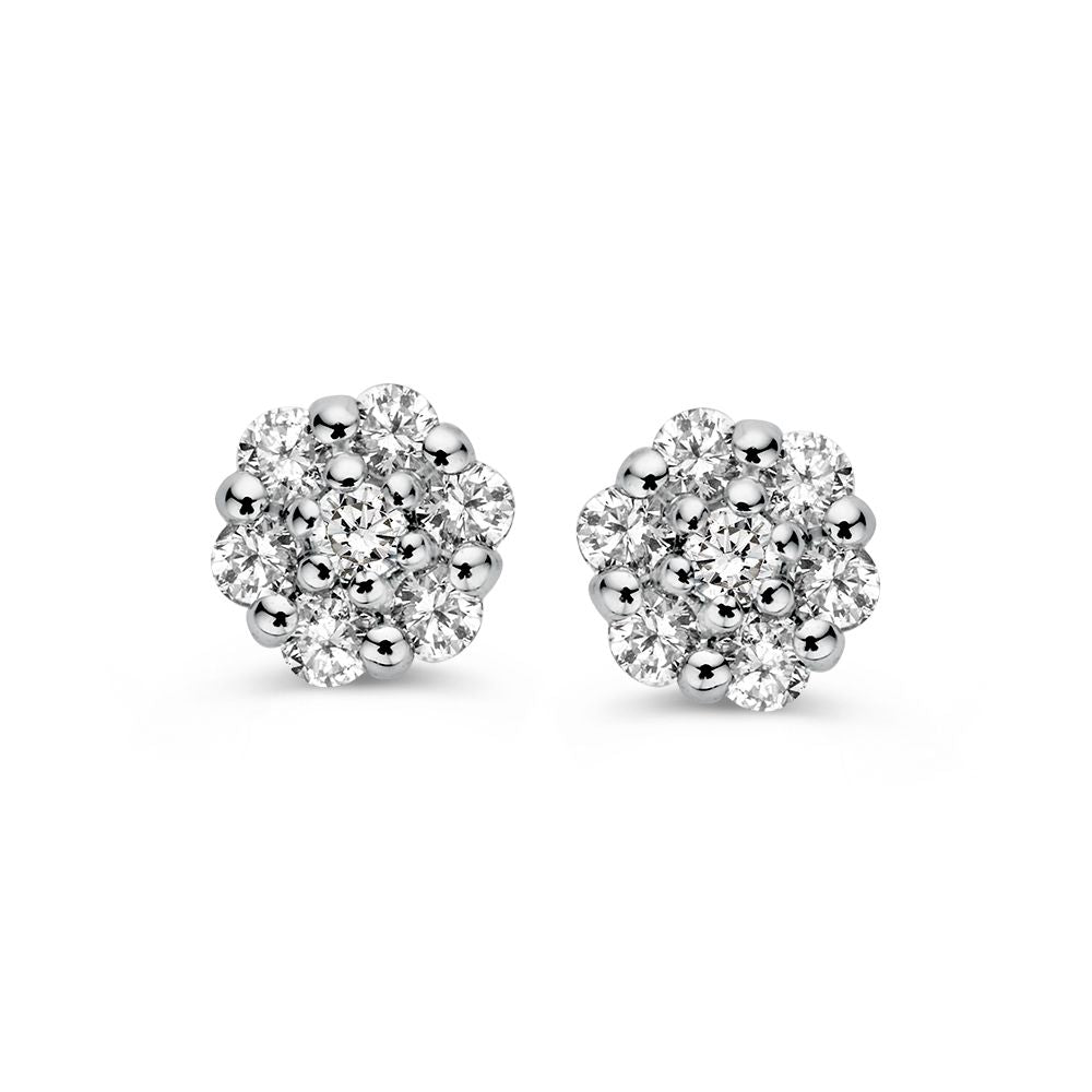 Srebrne kolczyki z diamentami w oprawie entourage, 0,16 ct, w kształcie kwiatka.