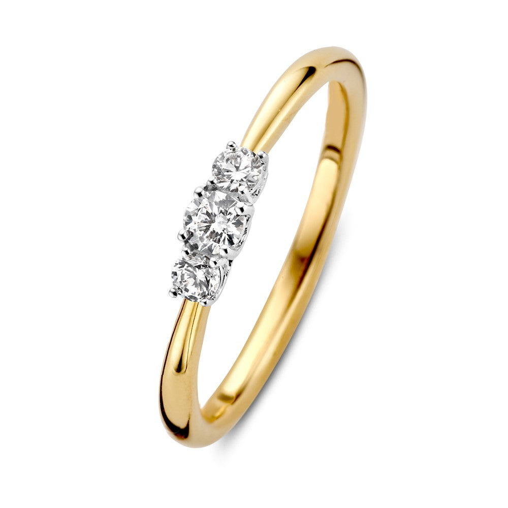 Bicolor pierścionek z trzema diamentami o łącznej wadze 0,24 ct, złota obrączka.