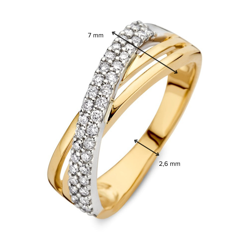 Bicolor pierścionek z białego i żółtego złota z diamentami 0.30 crt.