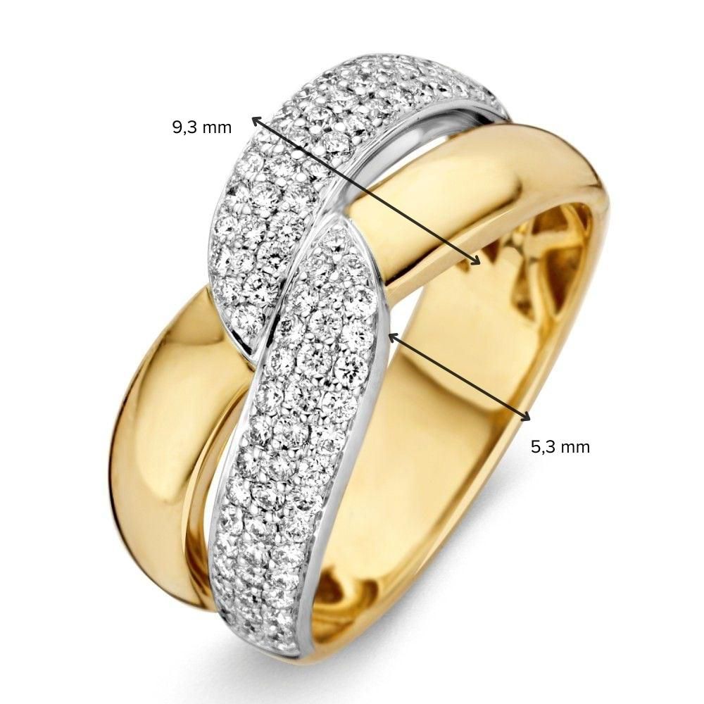 Bicolor pierścionek z żółtego i białego złota z diamentem brylantowym 0.61ct