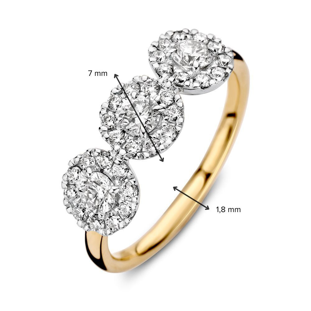 Bicolor złoty pierścionek z trzema diamentami 0.81ct H/SI-1 14 karat