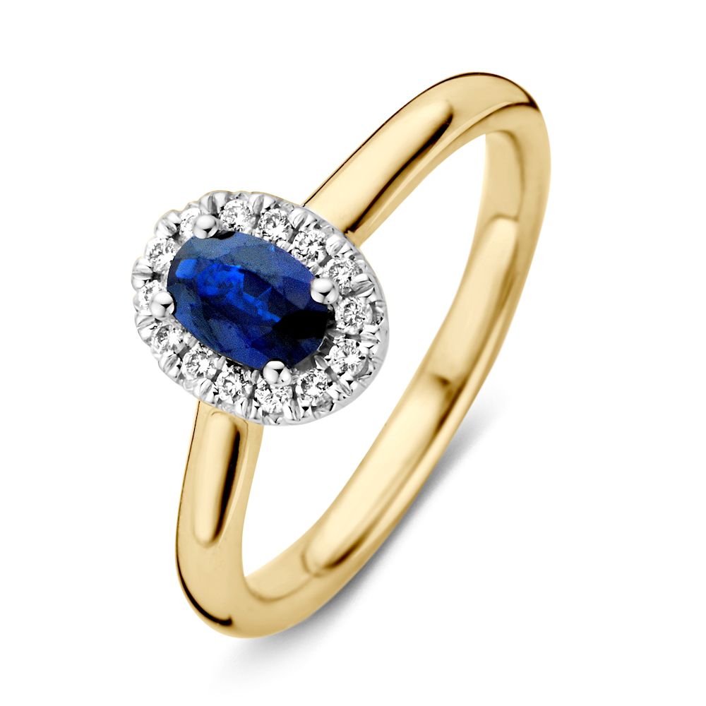 Gouden damesring met een ovale blauwe saffier omringd door een halo van diamanten.