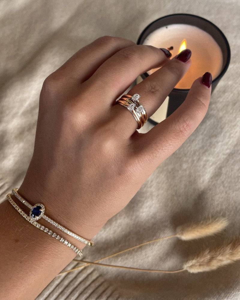 Pierścionek z 14k bicolor złota z diamentem w kształcie gruszki 0.23ct