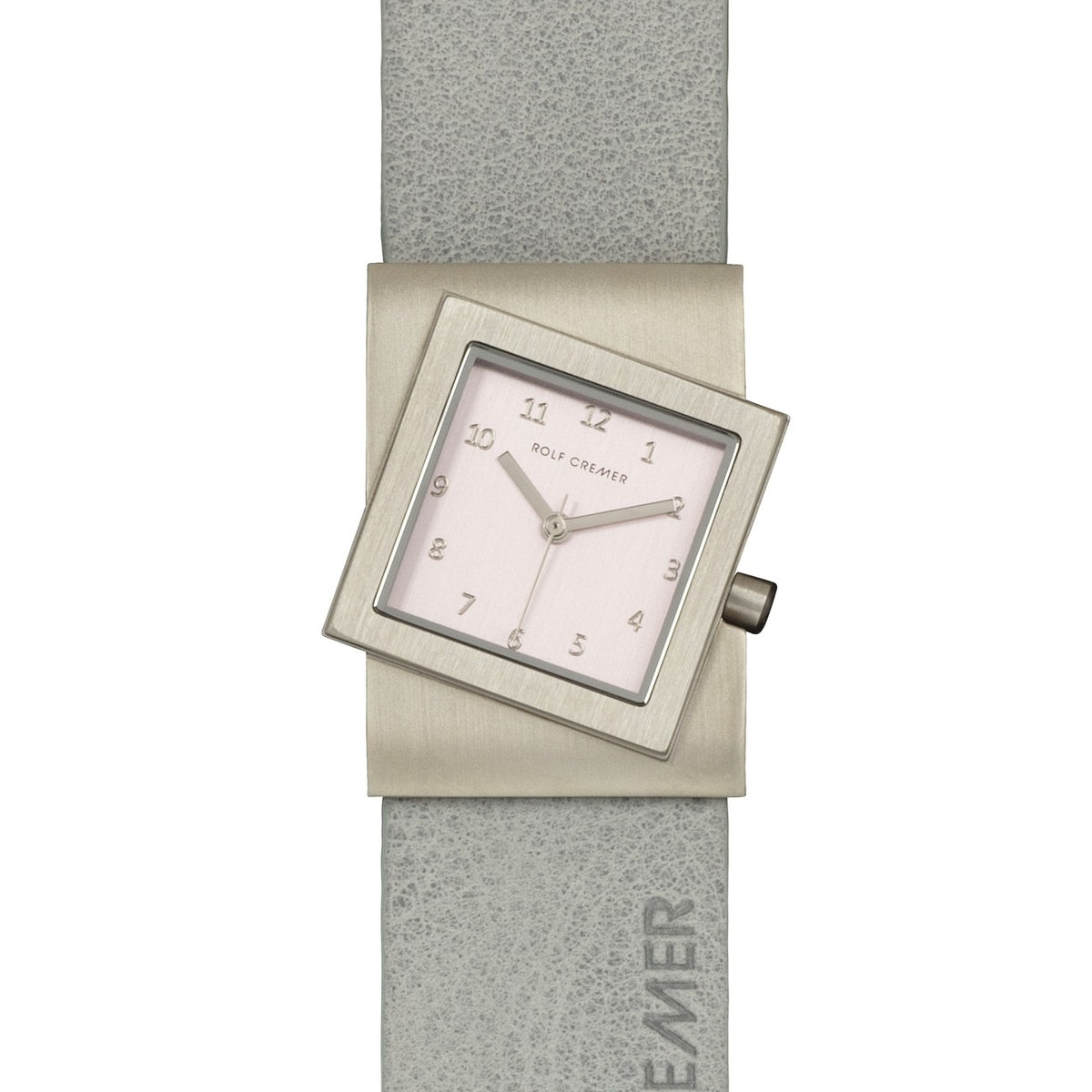 Vierkant Rolf Cremer horloge met een zilverkleurige kast, witte wijzerplaat en grijze leren band.