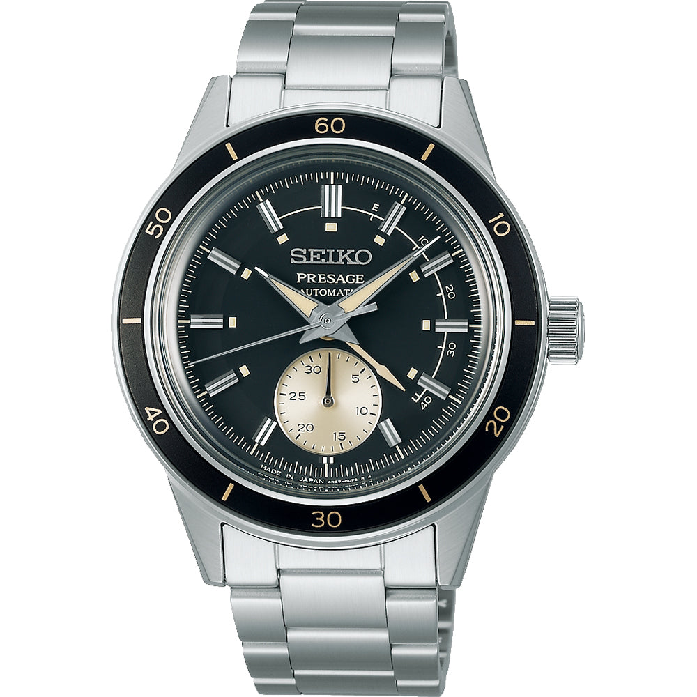 Het Seiko Presage heren horloge SSA449J1 heeft een elegante zwarte wijzerplaat met zilveren markeringen en wijzers, met een automatisch uurwerk, een kleine seconden sub-dial en een 60-minuten schaal op de lunette. Het is gevat in een roestvrijstalen kast en gecombineerd met een strakke zilveren armbandband.