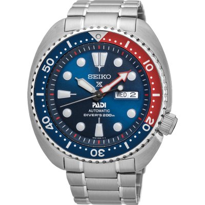 Zegarek Seiko Prospex Sea z niebieską tarczą, stalową kopertą i bransoletą, z czerwono-niebieską lunetą.