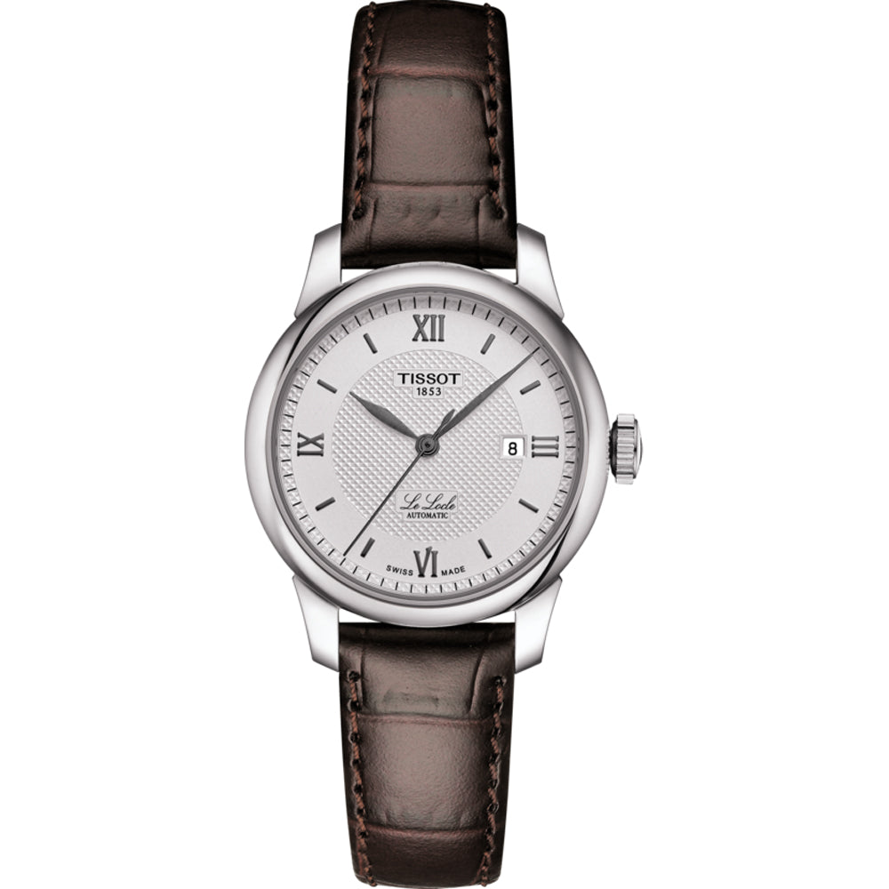 Zegarek Tissot Le Locle Automatic Lady z okrągłą srebrną tarczą, brązowym skórzanym paskiem i datownikiem.