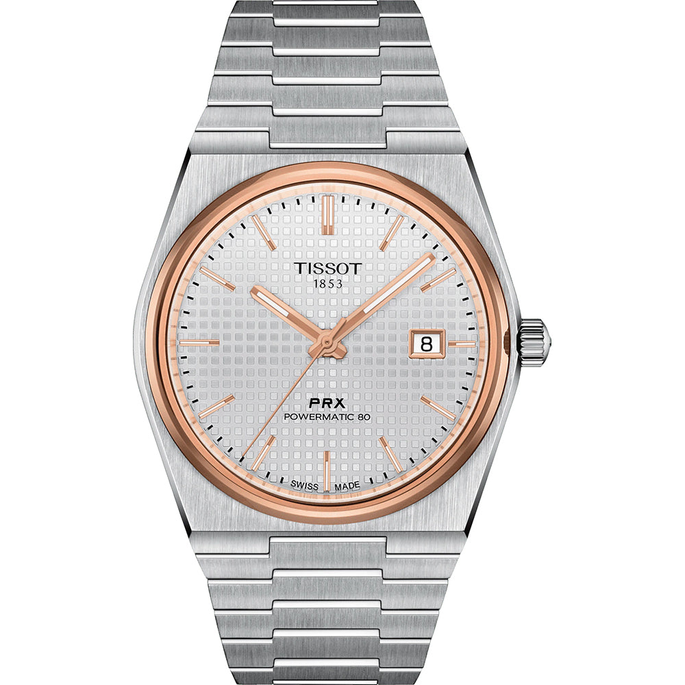 Srebrny zegarek Tissot PRX Powermatic 80 z różową kopertą, teksturowaną tarczą i bransoletą.
