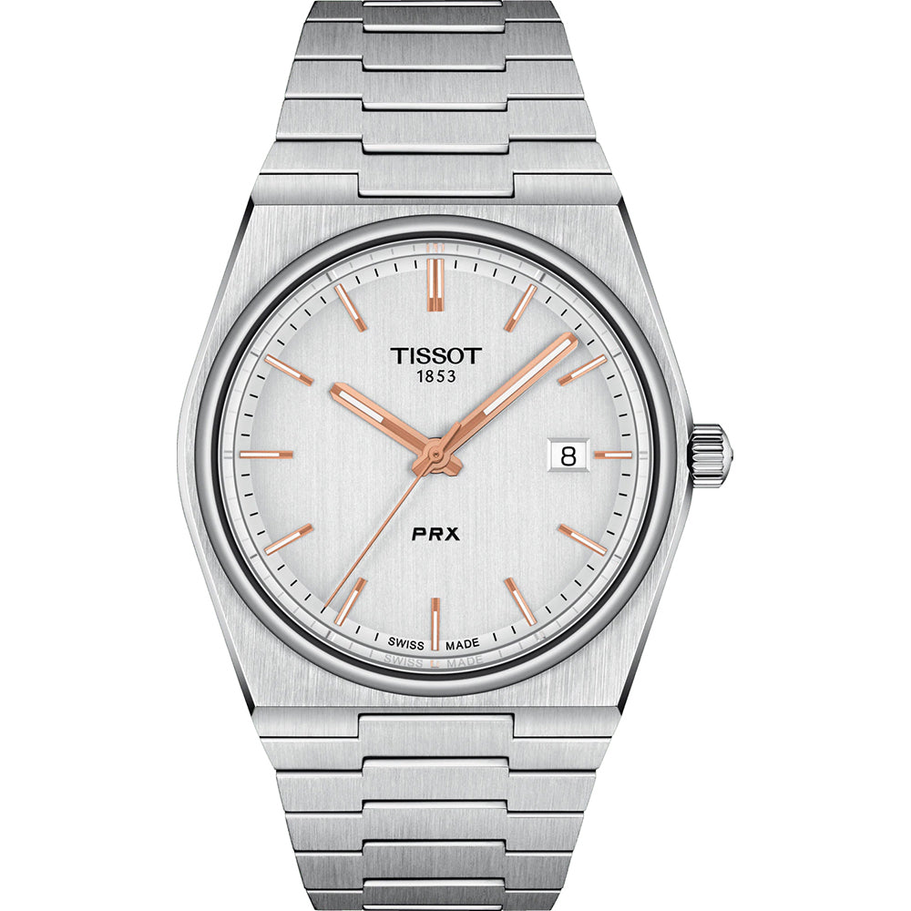 Zegarek Tissot PRX ze stalową kopertą, srebrną tarczą i różowymi wskazówkami.