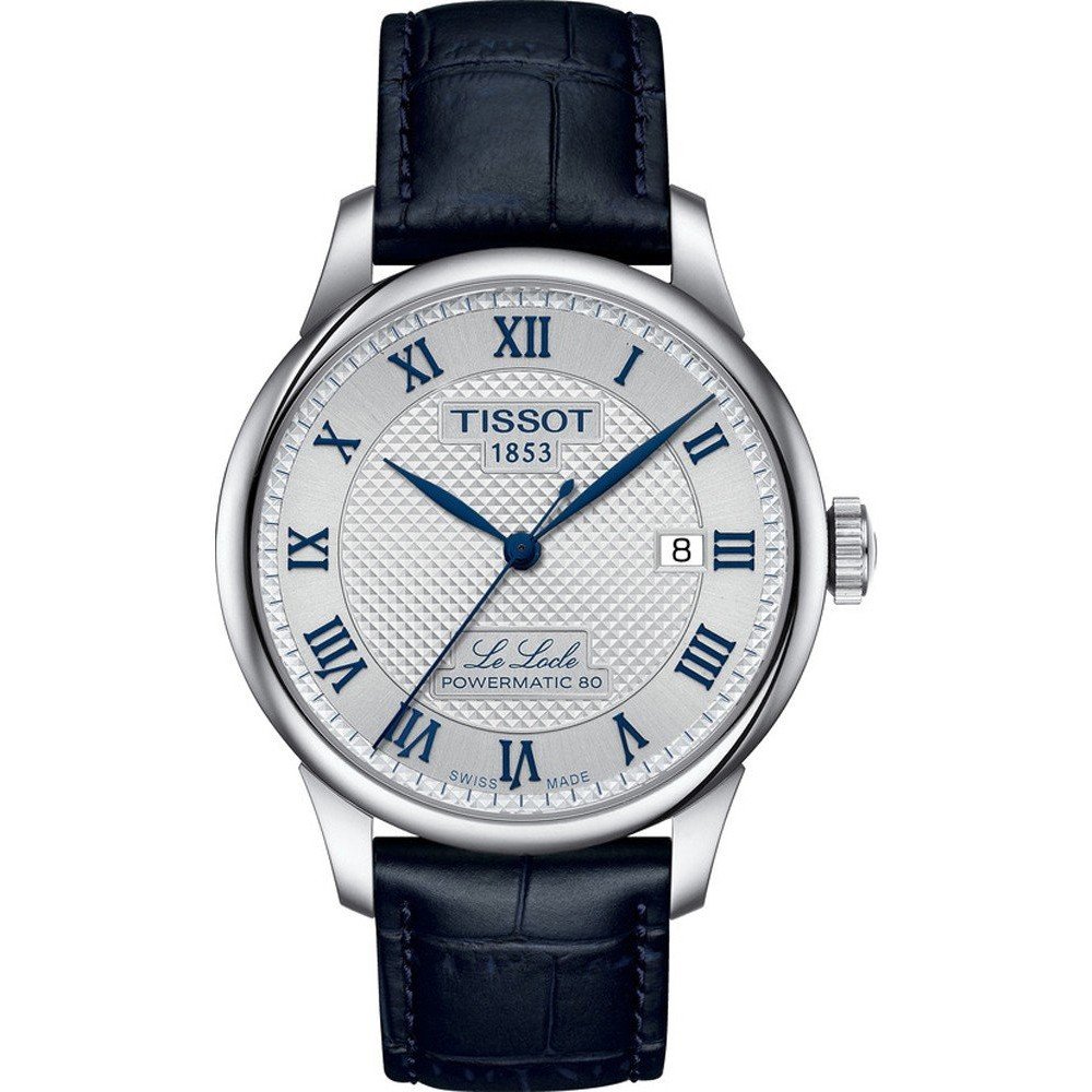 Zegarek Tissot Le Locle Powermatic 80 z okrągłą srebrną tarczą, niebieskim paskiem skórzanym i rzymskimi cyframi.