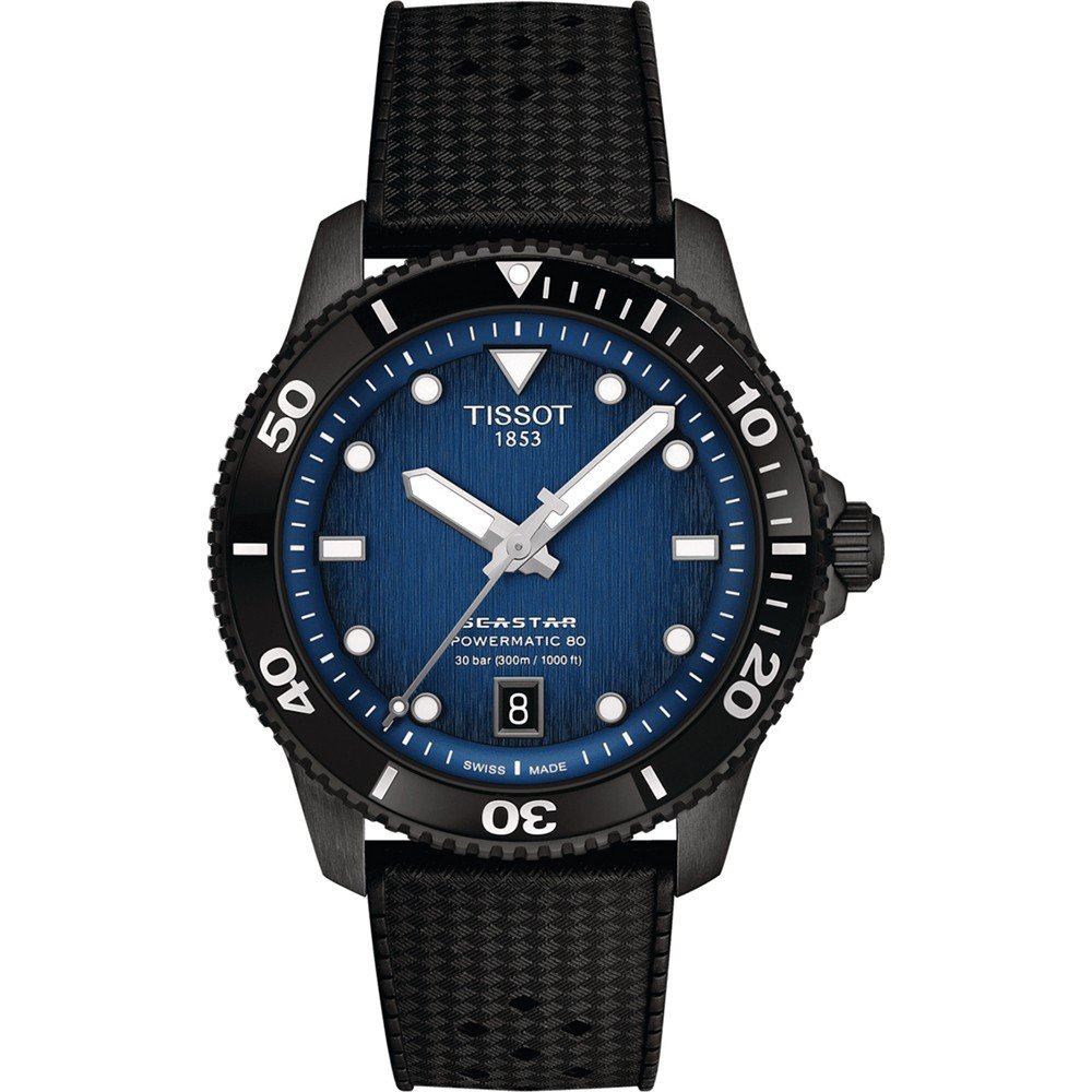 Zegarek Tissot Seastar 1000 z niebieską tarczą, czarną kopertą i gumowym paskiem.