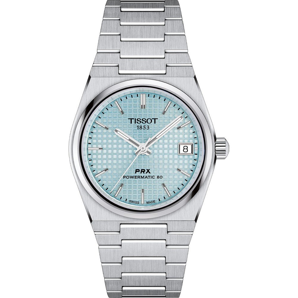 Srebrny zegarek Tissot PRX Powermatic 80 z niebieską tarczą i metalową bransoletą.