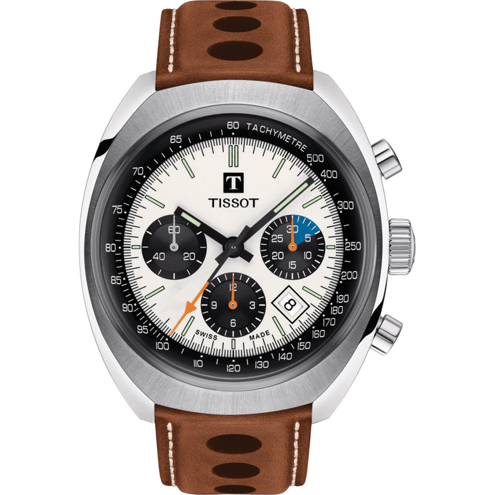 Zegarek Tissot Heritage 1973 z okrągłą kopertą, białą tarczą, brązowym paskiem i chronografem.