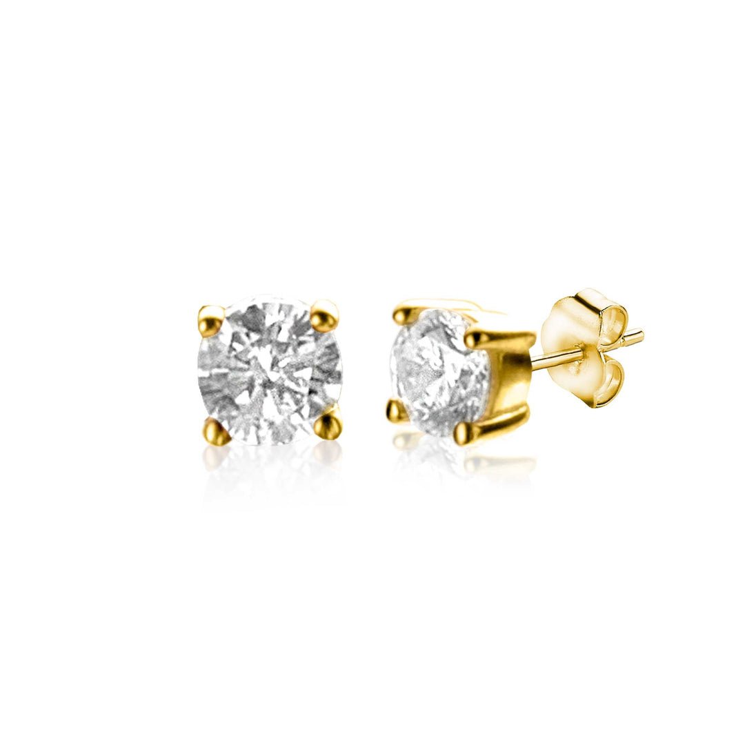 Zinzis Oorbellen Goud Zgo385 zijn ronde, briljant geslepen diamanten oorstekers gezet in gouden pootjes met vlinder achterkanten. De heldere schittering van de diamanten en de elegante Zinzi gouden zetting roepen de stijl van gouden oorknoppen op.
